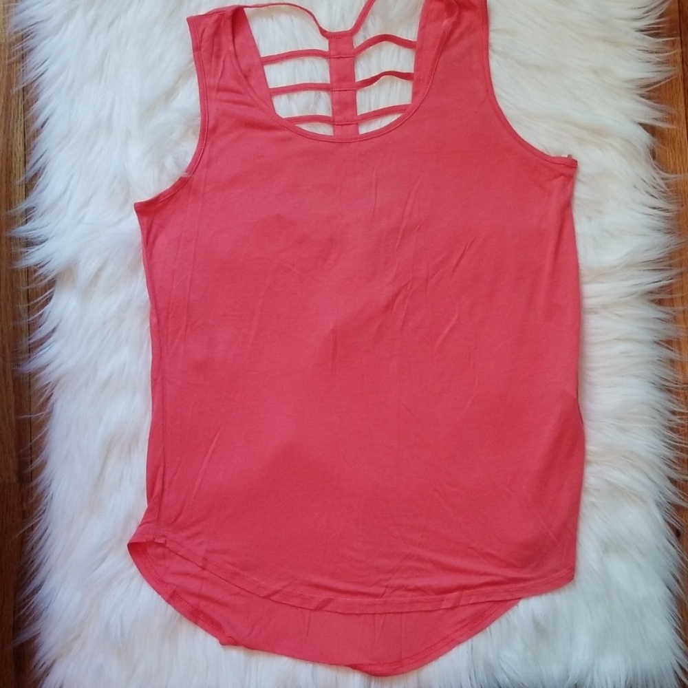 Coral top with cut out pattern